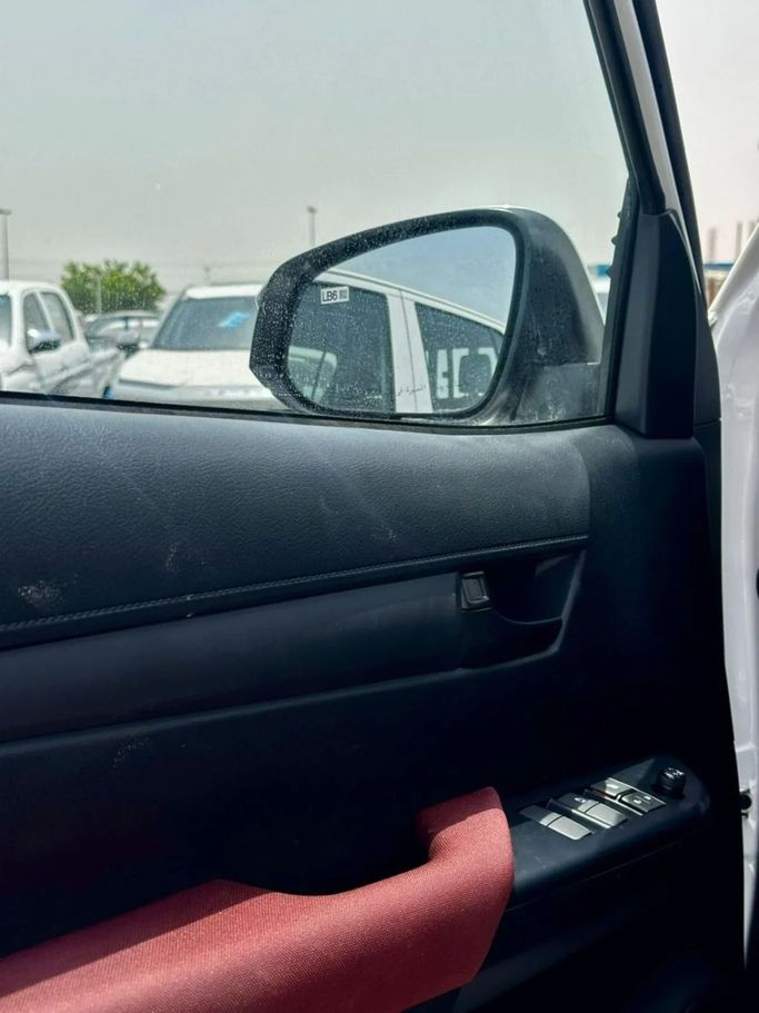 New Toyota Hilux Extra Cab VIII Facelift, 2.8 l, 2025 in Dubai by Pegasus Automobile, White color. GCC Specs | AUTO.AE