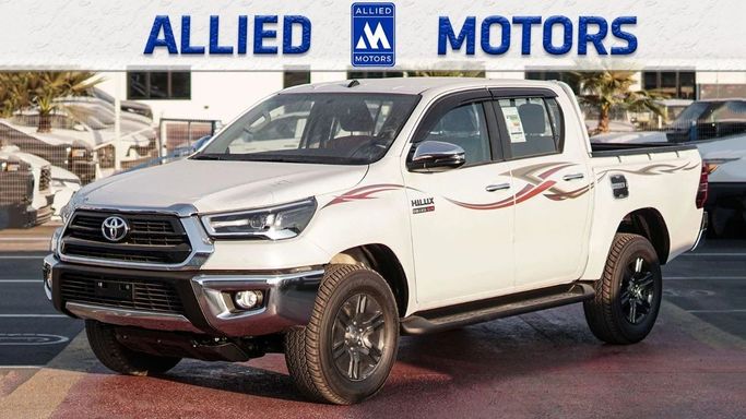 Новый Toyota Hilux VIII Рестайлинг, 2.4 л, 2025 в Дубае от Allied Motors Белый цвет. GCC | AUTO.AE