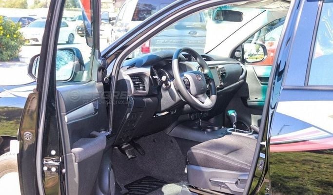 New Toyota Hilux VIII Facelift, 2.7 l, 2025 in Dubai by Segrex Auto, Black color. GCC Specs | AUTO.AE