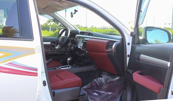 New Toyota Hilux VIII Facelift 2, 2.7 l, 2025 in Dubai by Segrex Auto, White color. GCC Specs | AUTO.AE