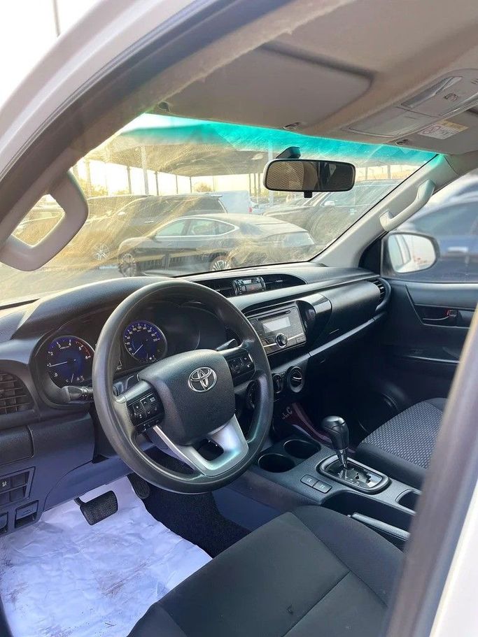 Used Toyota Hilux VIII, 2.4 l, 2018 in Dubai by Shalimar, White color. GCC Specs | AUTO.AE