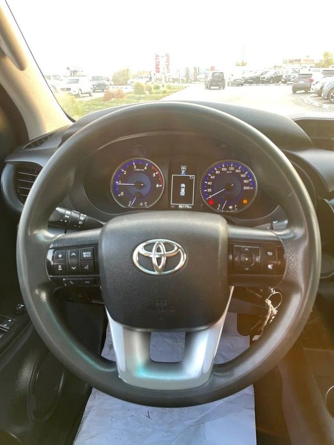 Used Toyota Hilux VIII, 2.4 l, 2018 in Dubai by Shalimar, White color. GCC Specs | AUTO.AE