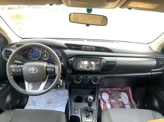 Used Toyota Hilux VIII, 2.4 l, 2018 in Dubai by Shalimar, White color. GCC Specs | AUTO.AE