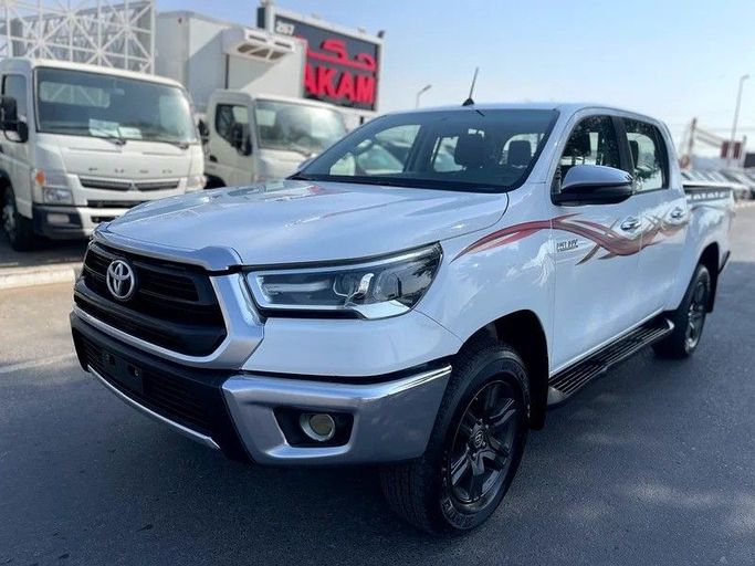 Used Toyota Hilux VIII Facelift, 2.7 l, 2021 in Dubai by Shalimar, White color. GCC Specs | AUTO.AE
