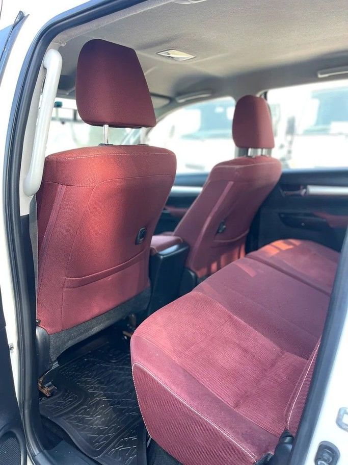 Used Toyota Hilux VIII Facelift, 2.7 l, 2021 in Dubai by Shalimar, White color. GCC Specs | AUTO.AE