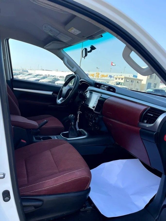 Used Toyota Hilux VIII Facelift, 2.7 l, 2021 in Dubai by Shalimar, White color. GCC Specs | AUTO.AE
