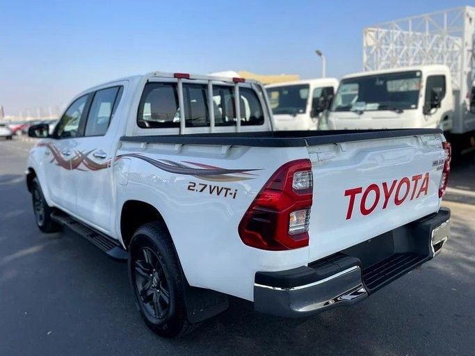 Used Toyota Hilux VIII Facelift, 2.7 l, 2021 in Dubai by Shalimar, White color. GCC Specs | AUTO.AE