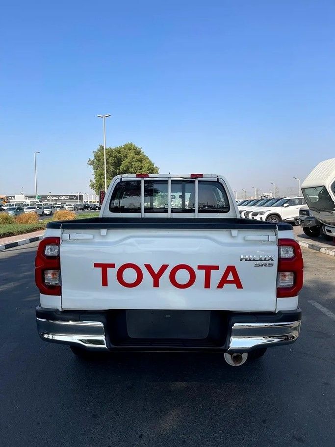 Used Toyota Hilux VIII Facelift, 2.7 l, 2021 in Dubai by Shalimar, White color. GCC Specs | AUTO.AE