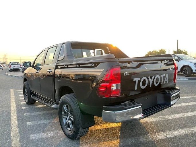Подержанный Toyota Hilux VIII, 2.7 л, 2019 в Дубае от Shalimar Черный цвет. GCC | AUTO.AE