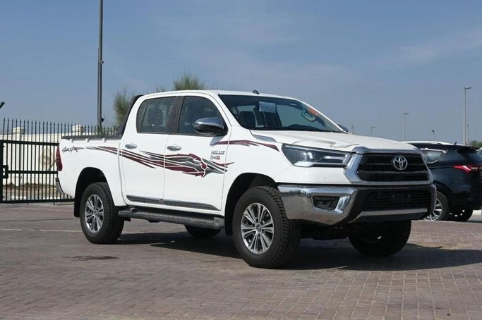 New Toyota Hilux VIII, 2.4 l, 2025 in Dubai by World Center Motors FZE, White color. GCC Specs | AUTO.AE