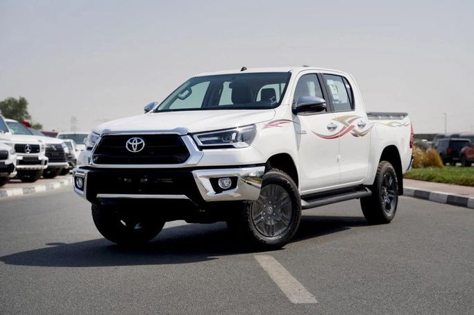 New Toyota Hilux VIII, 2.7 l, 2025 in Dubai by World Center Motors FZE, White color. GCC Specs | AUTO.AE