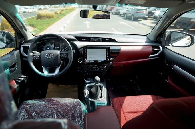 New Toyota Hilux VIII, 2.7 l, 2025 in Dubai by World Center Motors FZE, White color. GCC Specs | AUTO.AE