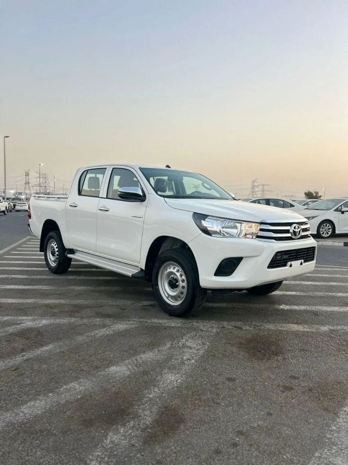 New Toyota Hilux VIII, 2.7 l, 2025 in Dubai by World Center Motors FZE, White color. GCC Specs | AUTO.AE