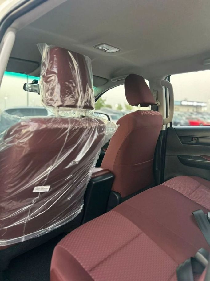 New Toyota Hilux VIII, 2.7 l, 2025 in Dubai by World Center Motors FZE, White color. GCC Specs | AUTO.AE
