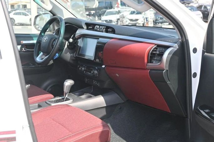 New Toyota Hilux VIII, 2.4 l, 2025 in Dubai by World Center Motors FZE, White color. GCC Specs | AUTO.AE