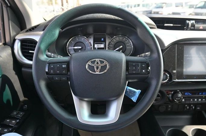 New Toyota Hilux VIII, 2.4 l, 2025 in Dubai by World Center Motors FZE, White color. GCC Specs | AUTO.AE