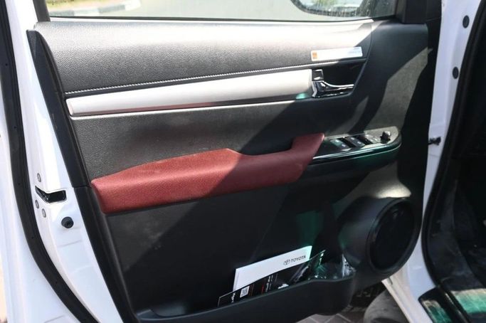 New Toyota Hilux VIII, 2.4 l, 2025 in Dubai by World Center Motors FZE, White color. GCC Specs | AUTO.AE