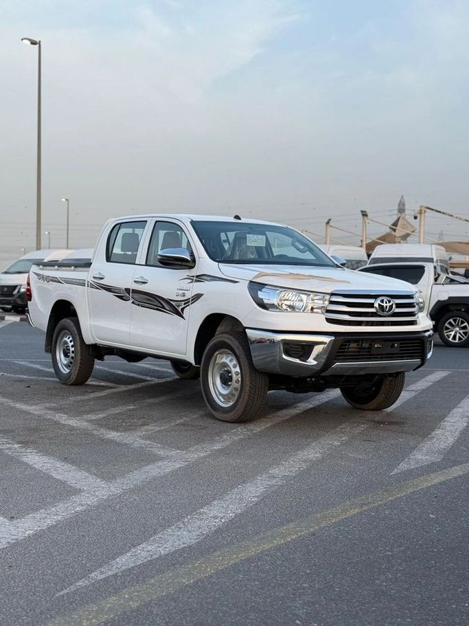 New Toyota Hilux VIII, 2.4 l, 2025 in Dubai by World Center Motors FZE, White color. GCC Specs | AUTO.AE