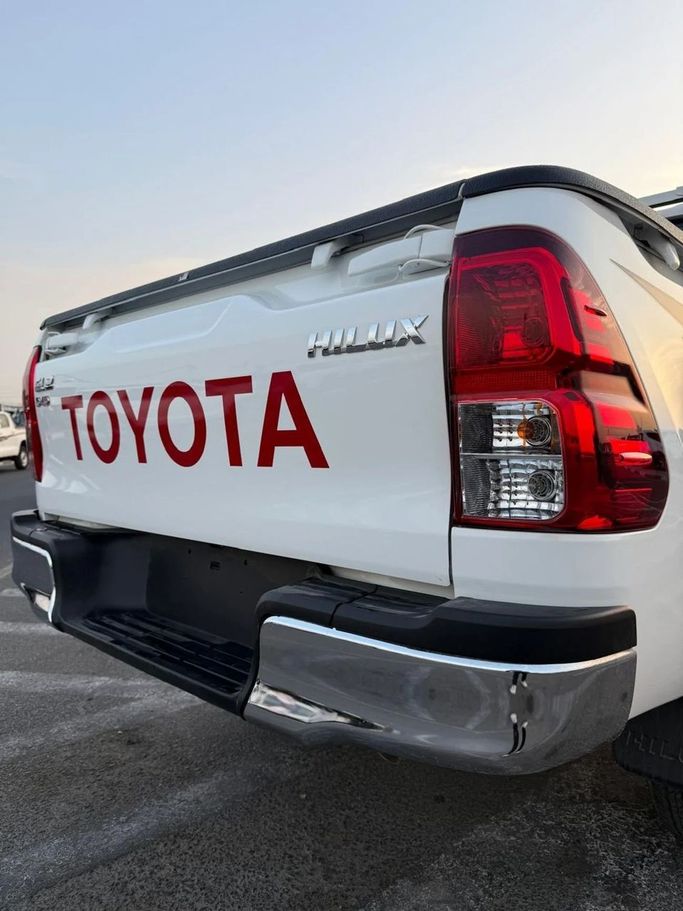 New Toyota Hilux VIII, 2.4 l, 2025 in Dubai by World Center Motors FZE, White color. GCC Specs | AUTO.AE