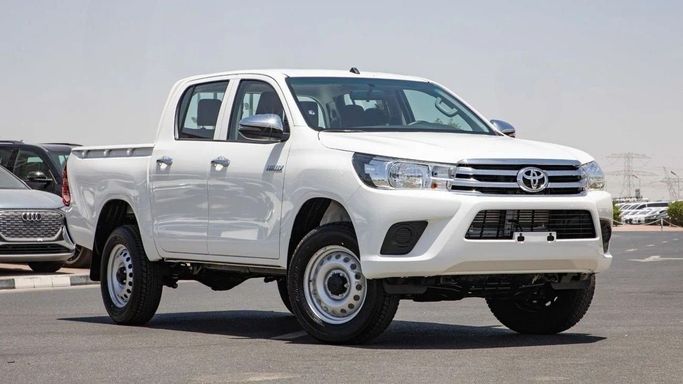 New Toyota Hilux VIII, 2.4 l, 2025 in Dubai by World Center Motors FZE, White color. GCC Specs | AUTO.AE