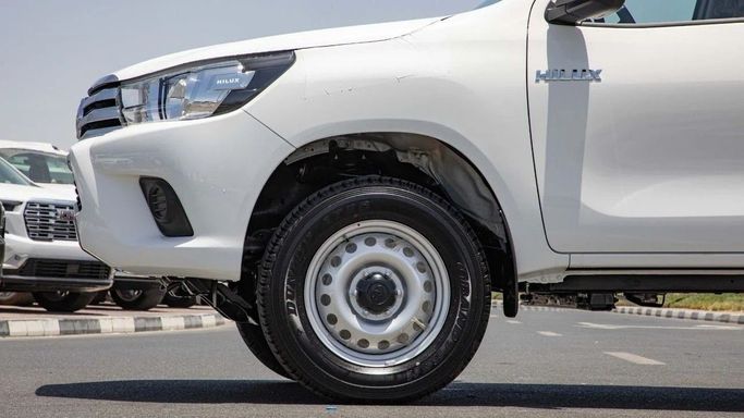 New Toyota Hilux VIII, 2.4 l, 2025 in Dubai by World Center Motors FZE, White color. GCC Specs | AUTO.AE