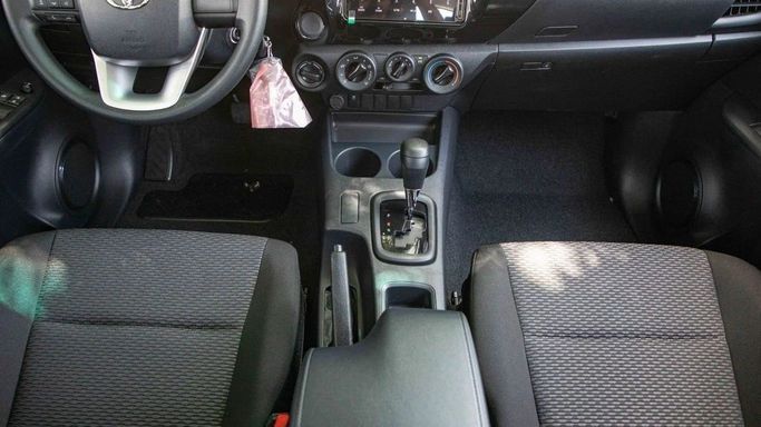 New Toyota Hilux VIII, 2.4 l, 2025 in Dubai by World Center Motors FZE, White color. GCC Specs | AUTO.AE