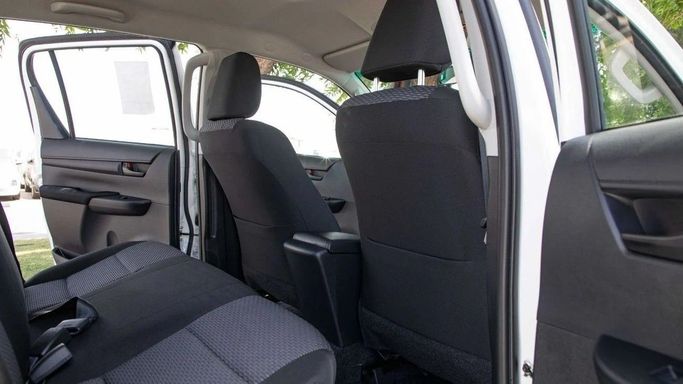 New Toyota Hilux VIII, 2.4 l, 2025 in Dubai by World Center Motors FZE, White color. GCC Specs | AUTO.AE