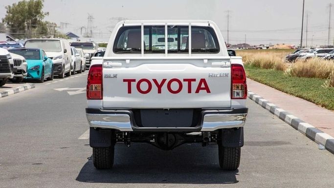 New Toyota Hilux VIII, 2.4 l, 2025 in Dubai by World Center Motors FZE, White color. GCC Specs | AUTO.AE