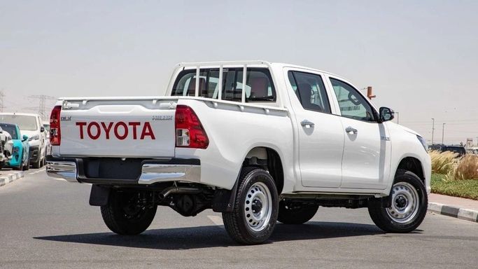 New Toyota Hilux VIII, 2.4 l, 2025 in Dubai by World Center Motors FZE, White color. GCC Specs | AUTO.AE