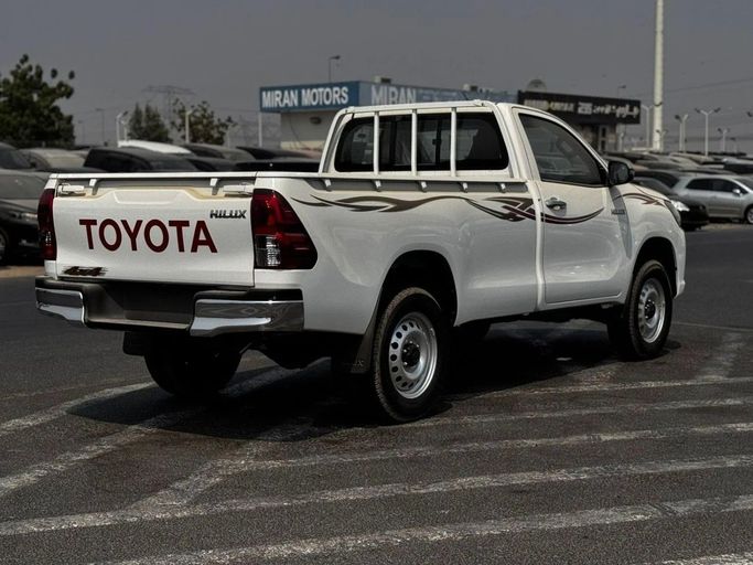 New Toyota Hilux VIII, 2.7 l, 2025 in Dubai by World Center Motors FZE, White color. GCC Specs | AUTO.AE