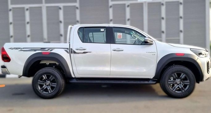 New Toyota Hilux VIII, 4.0 l, 2025 in Dubai by World Center Motors FZE, White color. GCC Specs | AUTO.AE