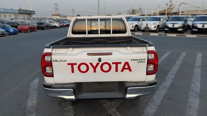 New Toyota Hilux VIII, 2.7 l, 2025 in Dubai by World Center Motors FZE, White color. GCC Specs | AUTO.AE
