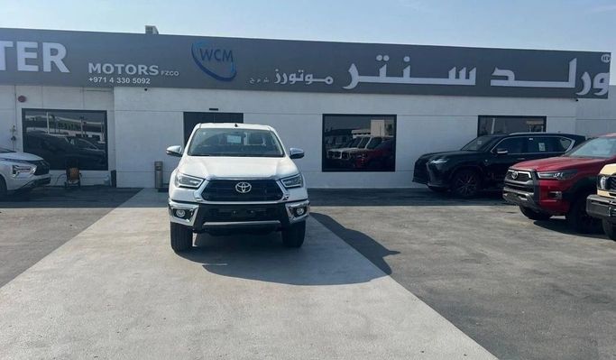 New Toyota Hilux VIII, 2.7 l, 2025 in Dubai by World Center Motors FZE, White color. GCC Specs | AUTO.AE