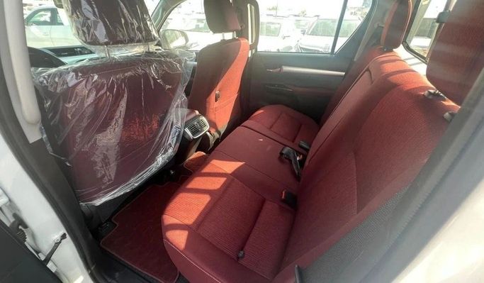 New Toyota Hilux VIII, 2.7 l, 2025 in Dubai by World Center Motors FZE, White color. GCC Specs | AUTO.AE