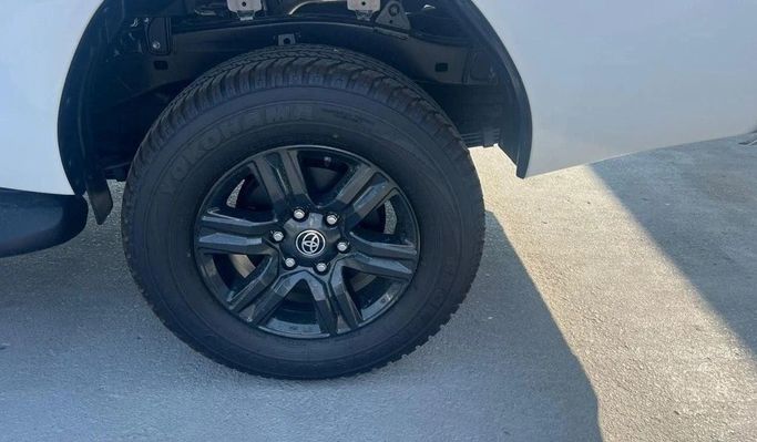 New Toyota Hilux VIII, 2.7 l, 2025 in Dubai by World Center Motors FZE, White color. GCC Specs | AUTO.AE