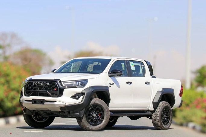 New Toyota Hilux VIII, 4.0 l, 2024 in Dubai by Atlantic Motors FZCO, White color. GCC Specs | AUTO.AE