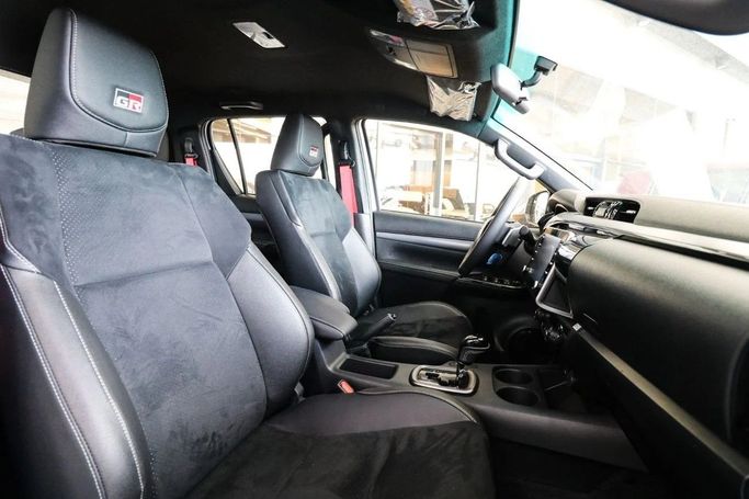 New Toyota Hilux VIII, 4.0 l, 2024 in Dubai by Atlantic Motors FZCO, White color. GCC Specs | AUTO.AE