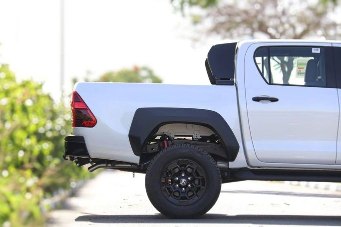New Toyota Hilux VIII, 4.0 l, 2024 in Dubai by Atlantic Motors FZCO, White color. GCC Specs | AUTO.AE
