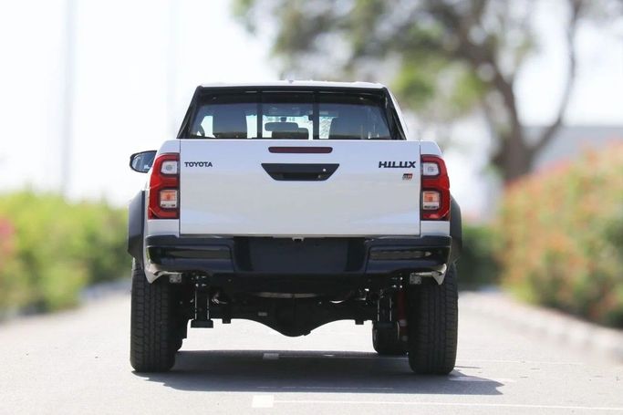 New Toyota Hilux VIII, 4.0 l, 2024 in Dubai by Atlantic Motors FZCO, White color. GCC Specs | AUTO.AE
