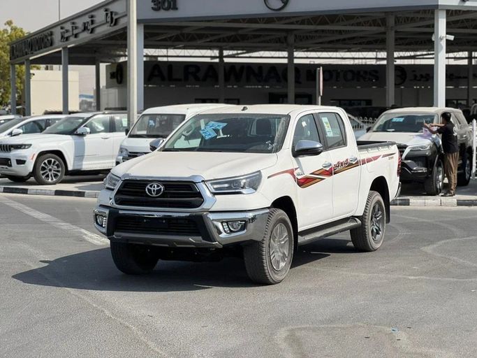 New Toyota Hilux VIII Facelift, 2.7 l, 2025 in Dubai by Al Rawnaq Motors , White color. GCC Specs | AUTO.AE