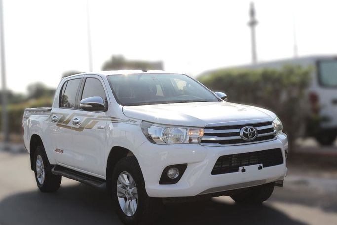 Used Toyota Hilux VIII, 2.4 l, 2018 in Dubai by Power Wagon Motors, White color. European Specs | AUTO.AE