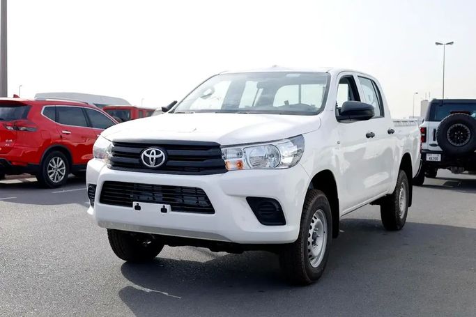 New Toyota Hilux VIII, 2.4 l, 2025 in Dubai by Wafrah Automotive Fzco, White color.  | AUTO.AE