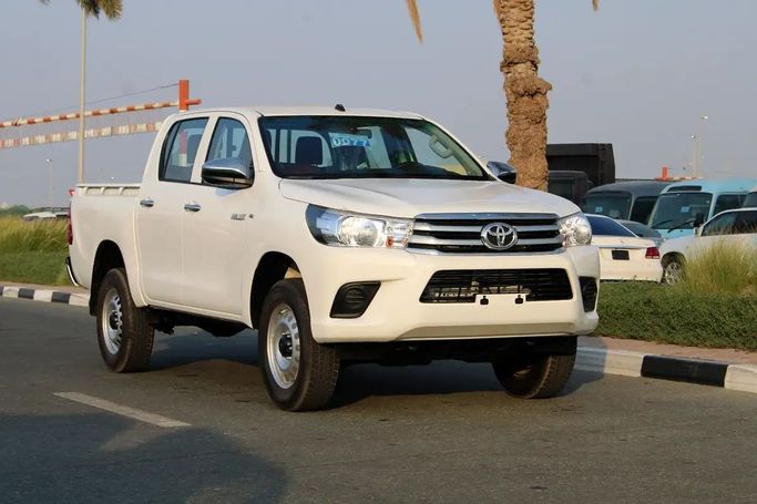 New Toyota Hilux VIII Facelift, 2.4 l, 2025 in Dubai by Wafrah Automotive Fzco, White color. GCC Specs | AUTO.AE