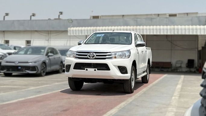 New Toyota Hilux VIII, 2.7 l, 2025 in Dubai by Rhodium Motors FZE, White color. GCC Specs | AUTO.AE