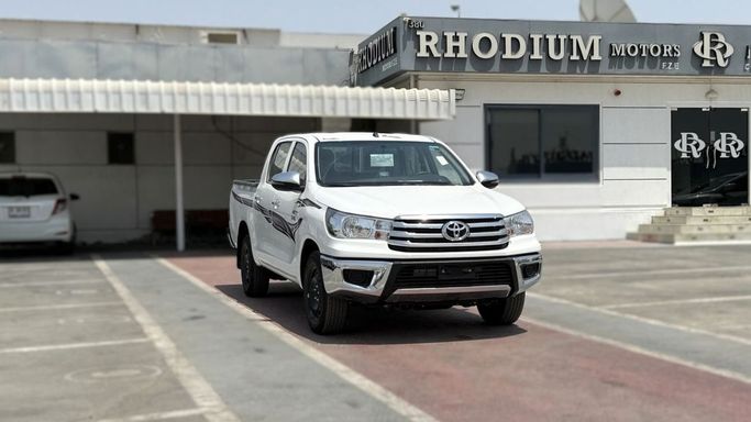 New Toyota Hilux VIII, 2.4 l, 2025 in Dubai by Rhodium Motors FZE, White color. GCC Specs | AUTO.AE