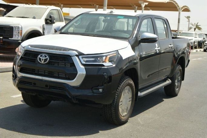 Новый Toyota Hilux VIII Рестайлинг, 2.4 л, 2024 в Дубае от Aryana Motors Fzco Черный цвет. Японская | AUTO.AE