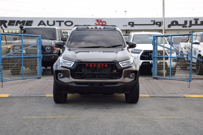 Подержанный Toyota Hilux VIII Рестайлинг, 2.8 л, 2020 в Дубае от Xtreme Auto FZE Коричневый цвет. Australian Specs | AUTO.AE