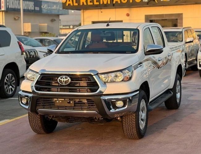 New Toyota Hilux VIII Facelift, 2.4 l, 2024 in Dubai by AL REEM AUTO, White color. GCC Specs | AUTO.AE