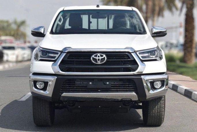 New Toyota Hilux VIII Facelift, 2.7 l, 2025 in Dubai by TARGET MOTORS FZE, White color. GCC Specs | AUTO.AE