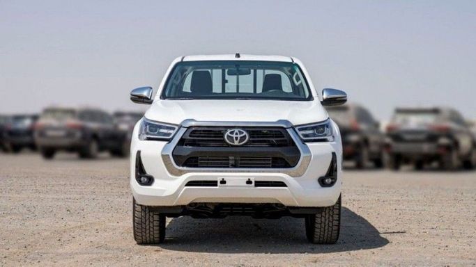 New Toyota Hilux VIII Facelift 2, 2.8 l, 2024 in Dubai by TARGET MOTORS FZE, White color. GCC Specs | AUTO.AE